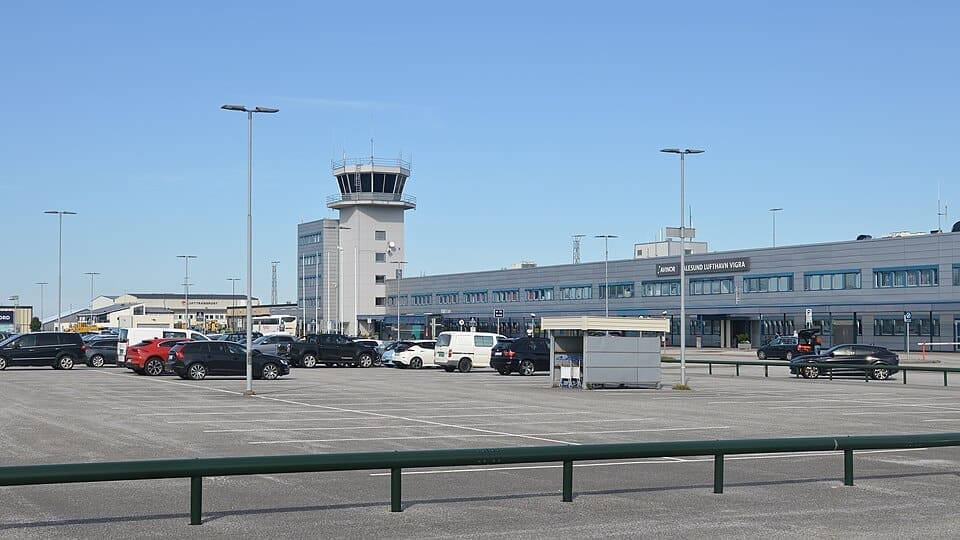 Aerial view of Ålesund Airport terminal and runway on Vigra island
