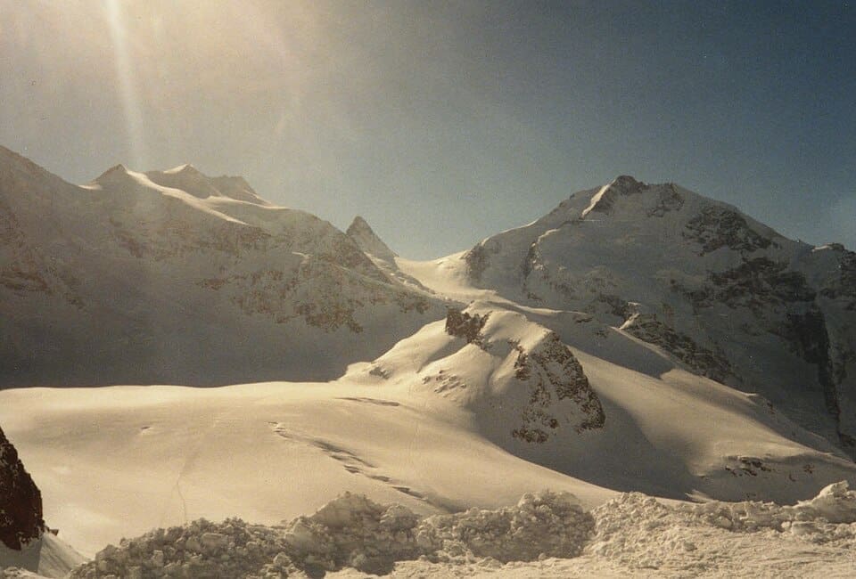 Sunset over the snowy slopes of Axamer Lizum ski area in Tyrol, Austria
