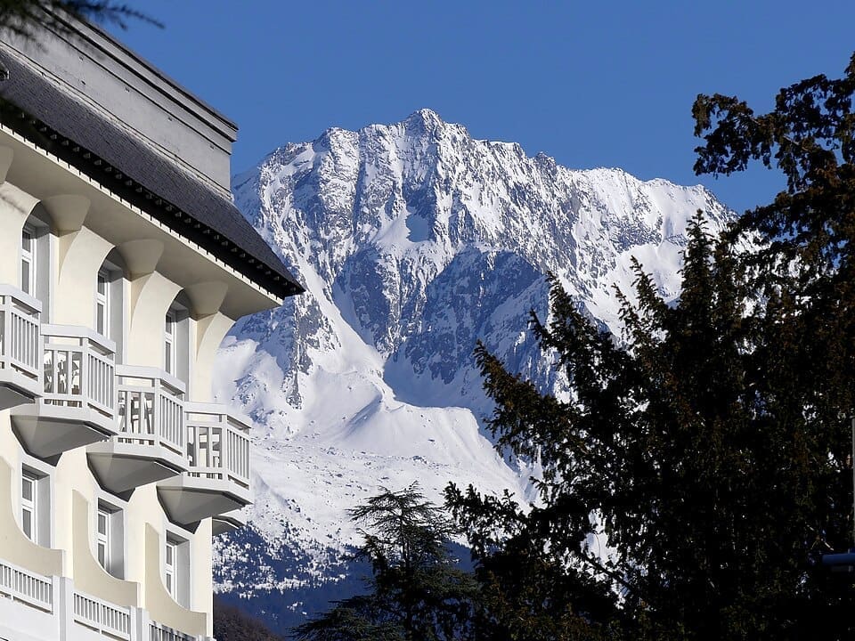 Mercure Grand Hôtel des Thermes in Brides-les-Bains with snow-covered Grand Bec mountain in the background