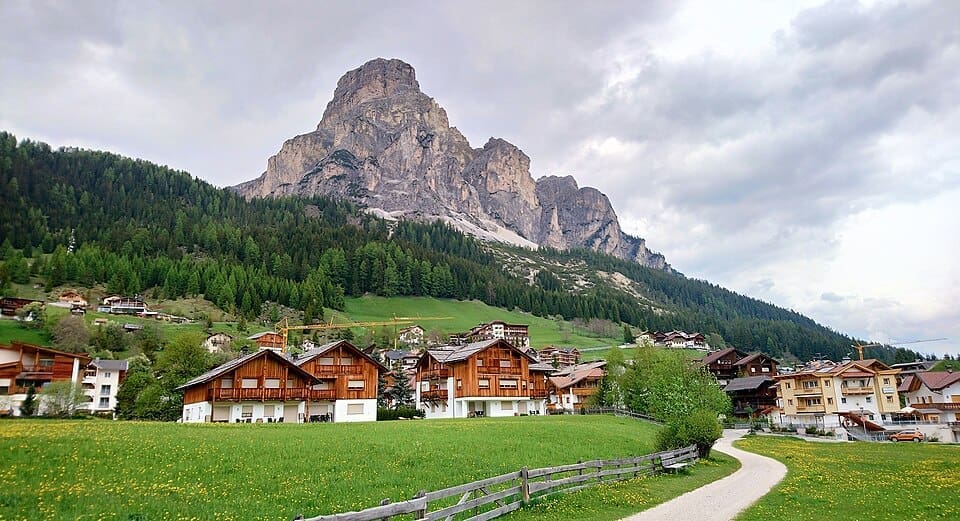 Sassongher mountain towering over the village of Corvara in Alta Badia, Italy