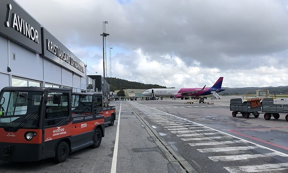 Overlooking the tarmac of Kristiansand Airport seen from the terminal access door for domestic arrivals.
