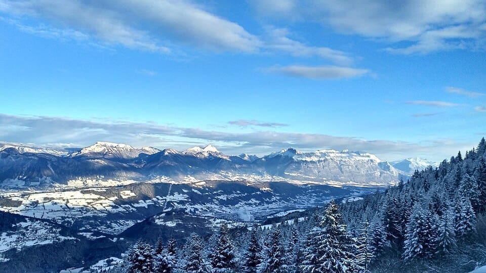 A view of the ski slopes and mountains at Le Collet d'Allevard in winter