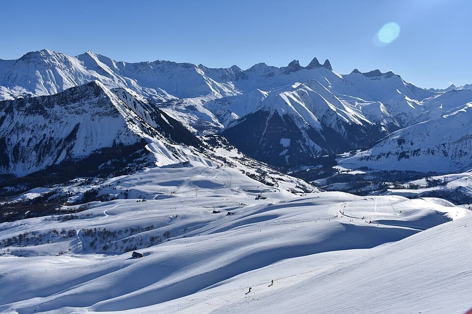 Ski slopes of Le Corbier with a view of the Aiguilles d'Arves