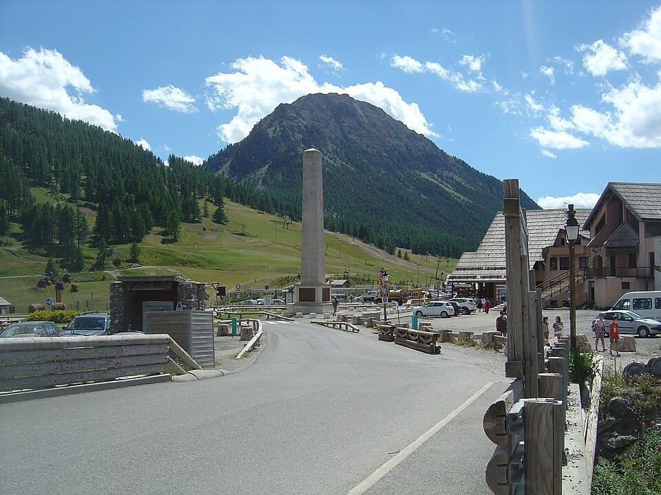 Col de Montgenèvre with the Napoleon obelisk and Château Jouan summit in the background