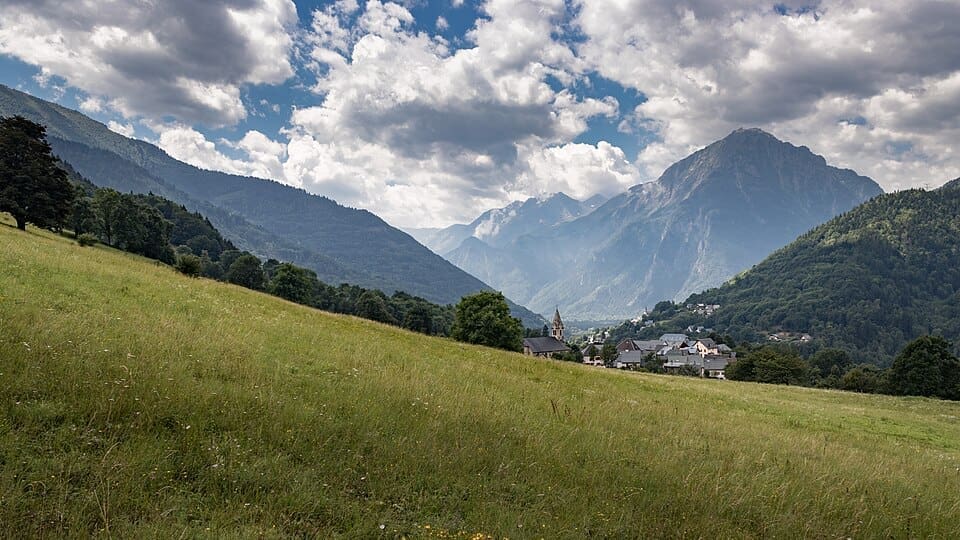 Distant view of Oz-en-Oisans village in summer