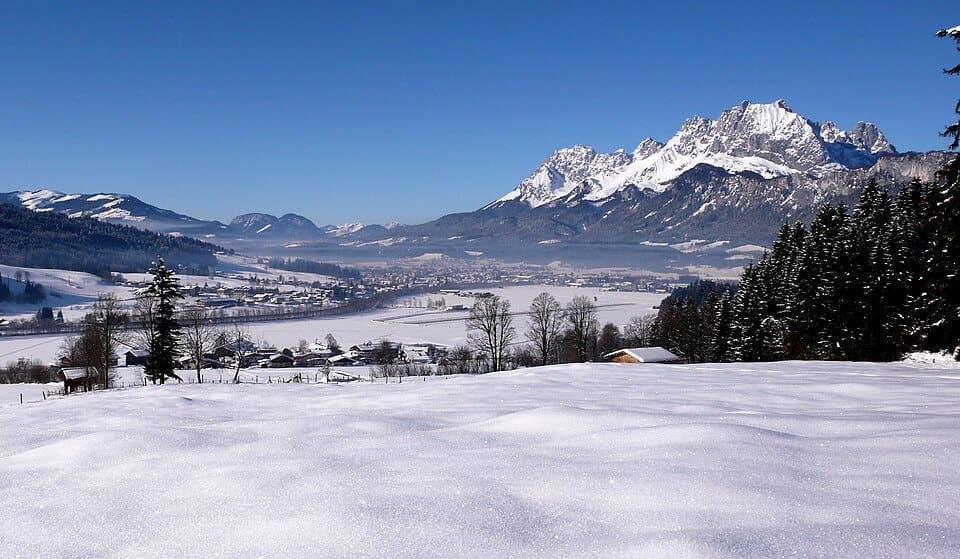St. Johann in Tirol winter panorama with the Kaisergebirge mountains in the background
