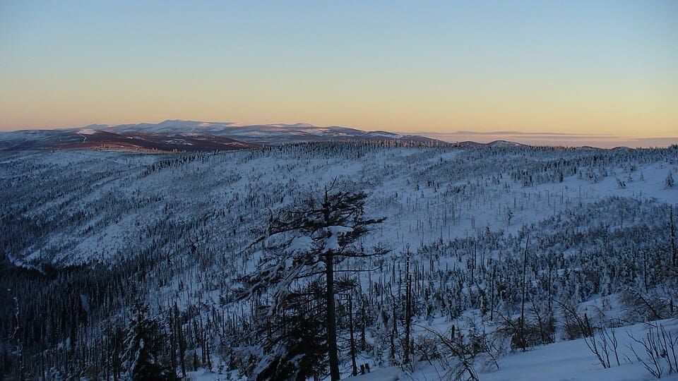 View of the forested Izera Mountains from Stóg Izerski in Świeradów-Zdrój