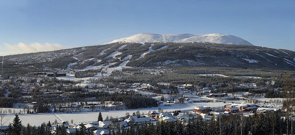 Trysil ski resort landscape showing groomed slopes rolling down through the pine forests