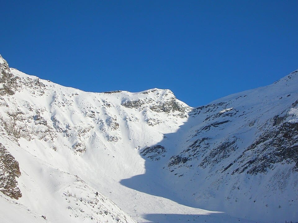 Snow-covered slopes of Pizzo Groppera and the Canalone in the Madesimo ski area