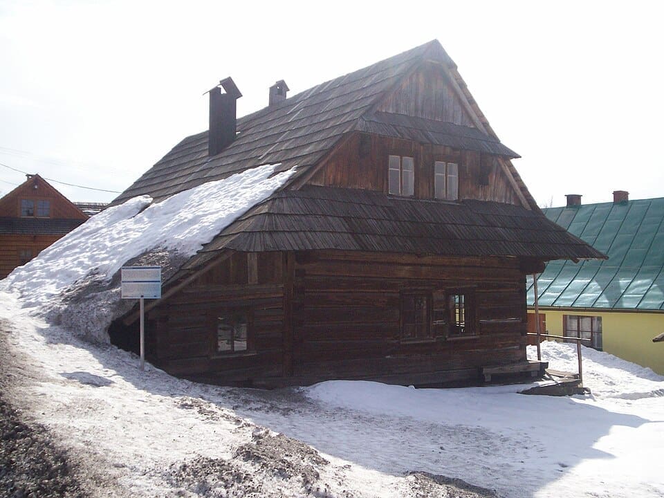 Traditional wooden Kawulok cottage in Istebna in winter